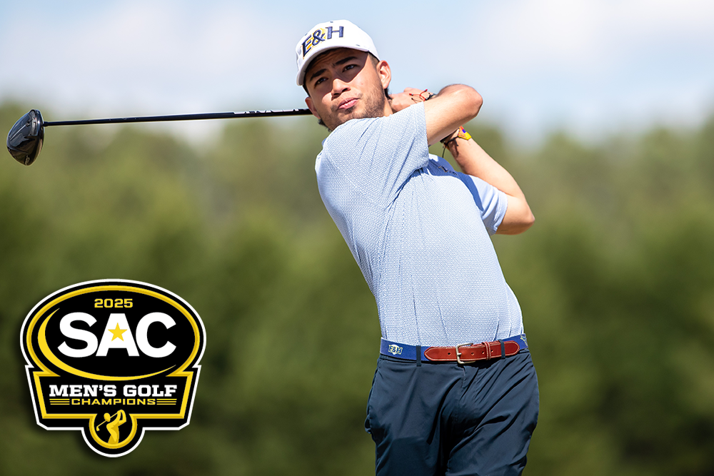 Jhon Ojeda after teeing off with SAC championship logo.