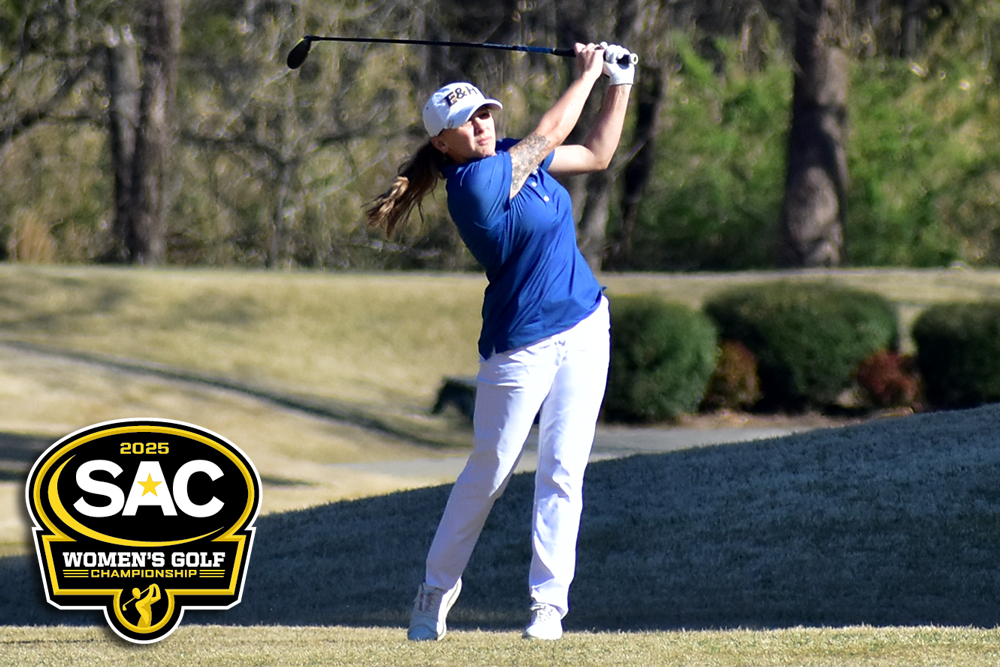 Lexi Humbert hits an iron shot.